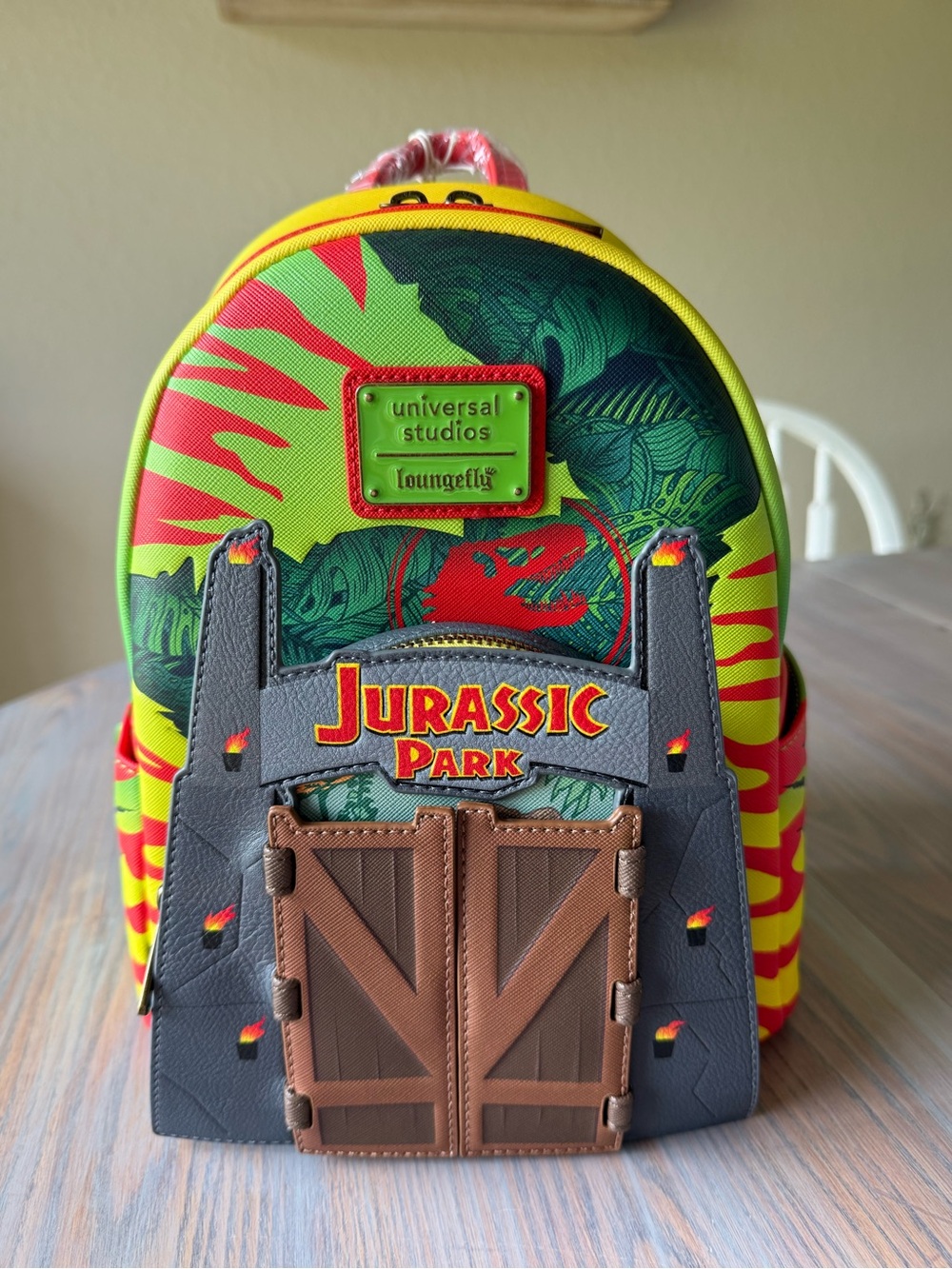 Loungefly Universal Studios Jurassic Park Gates Glow in the Dark Mini Backpack